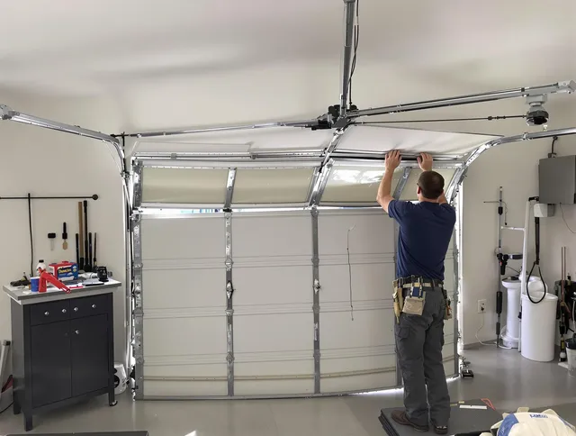 Palm Harbor Garage Door Repair specialist performing precise section replacement on Palm Harbor garage door