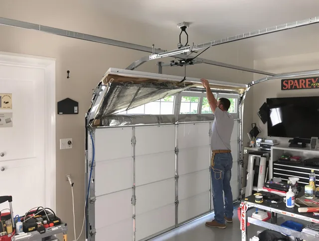 Garage door section replacement by Palm Harbor Garage Door Repair in Palm Harbor