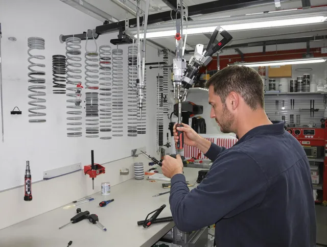 Palm Harbor Garage Door Repair safety certified technician performing precision spring replacement in Palm Harbor