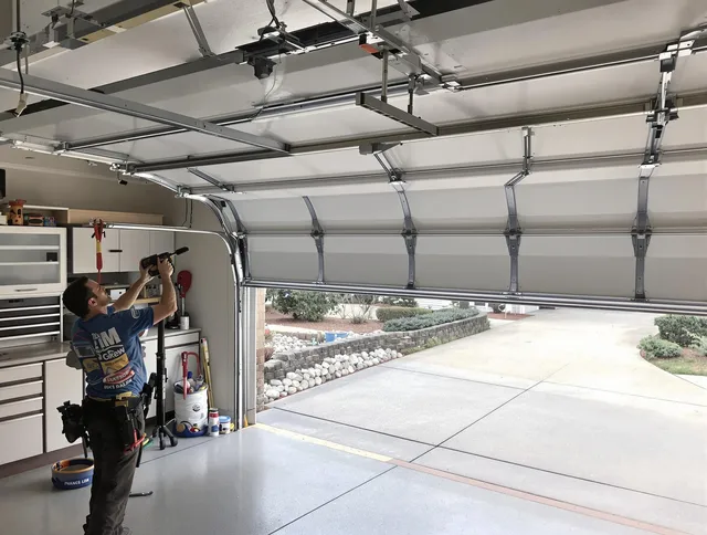 Garage door track repair service by Palm Harbor Garage Door Repair in Palm Harbor